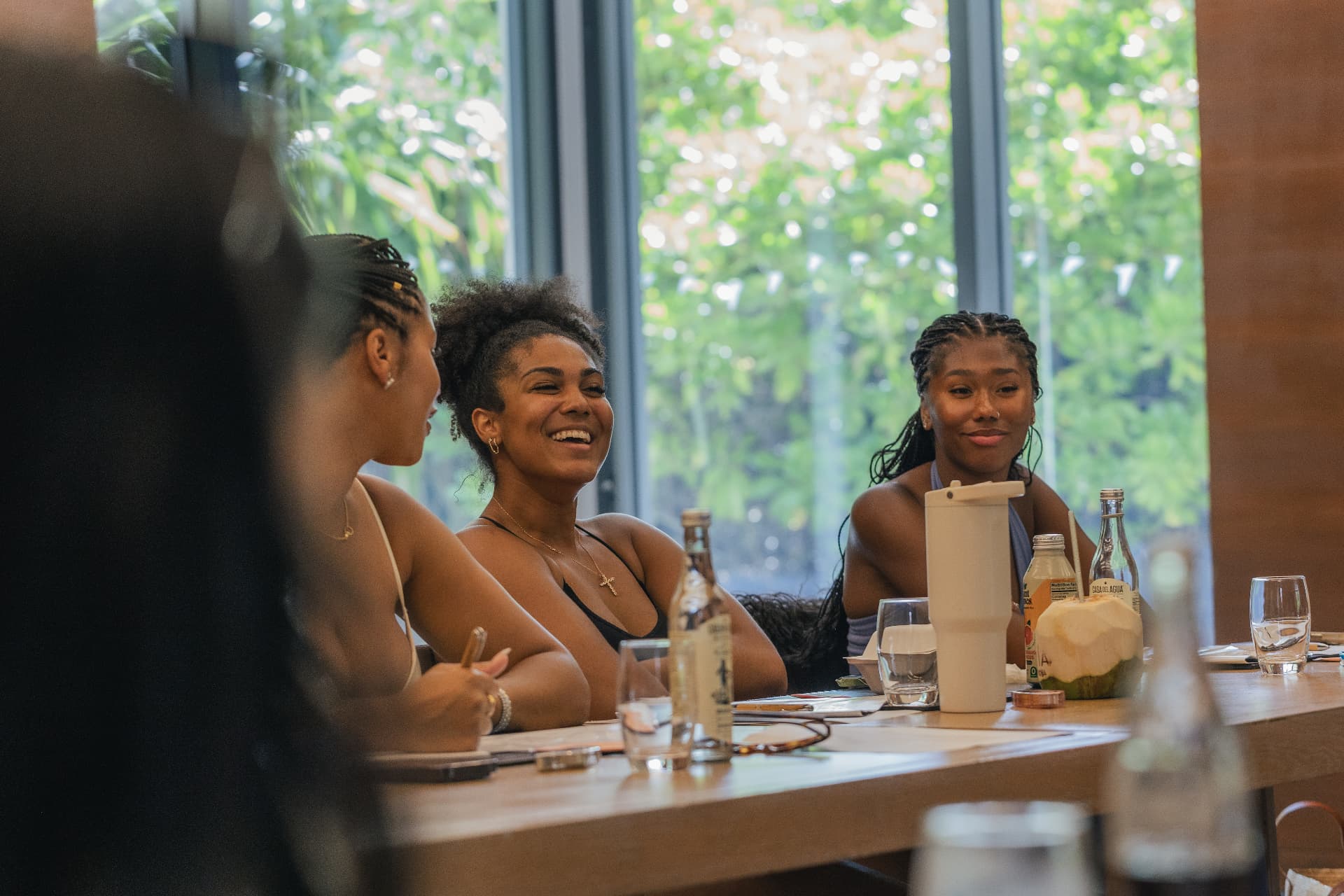 Ambassadors in a workshop session around a long table