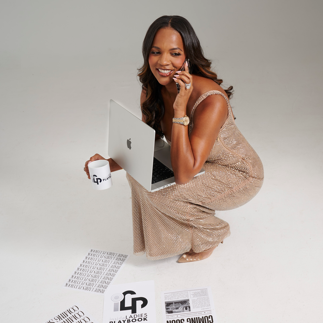 Atoya Burleson with Ladies Playbook branding materials