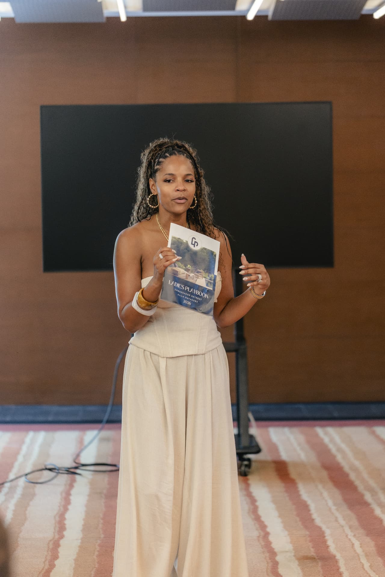 Atoya Burleson presenting the 2026 Ambassador Retreat program